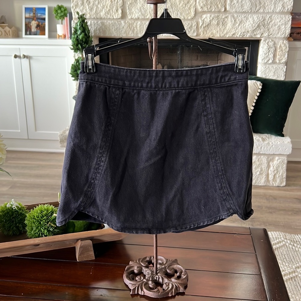 Size 23 (0-2) black denim mini skirt with back zip closure
